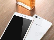 这oppo手机一触屏就有小白色的小圆圈怎么关