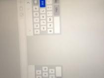 ipad打字键盘怎么变成两半了,求大神!